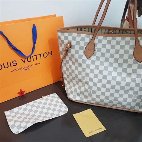 louis vuitton clon vs original|louis vuitton lv fabric.